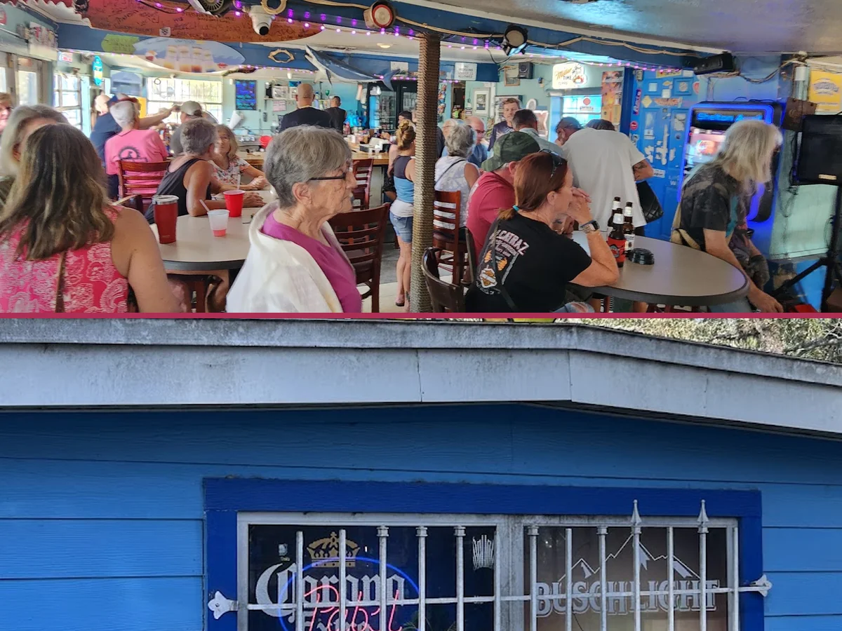 Interior tables and a relaxed dive-bar look.