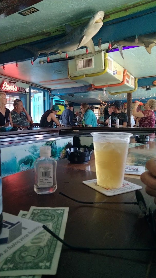 Interior tables and a relaxed dive-bar look.